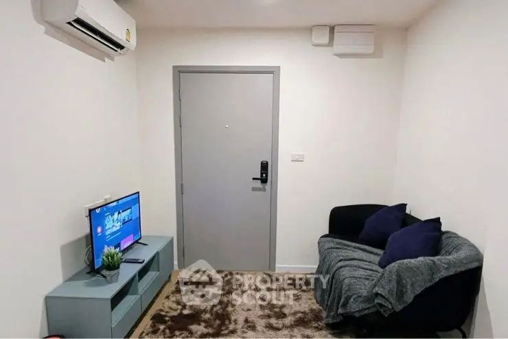 Cozy living room with modern decor and air conditioning