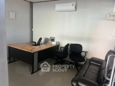 Modern office space with sleek furniture and air conditioning, ideal for productivity and comfort.