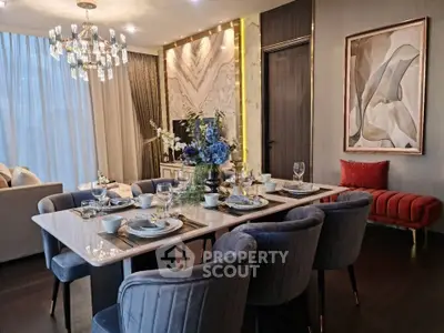 Luxurious dining room with elegant decor and modern chandelier