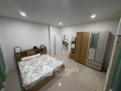 Spacious bedroom with modern furniture and sleek design