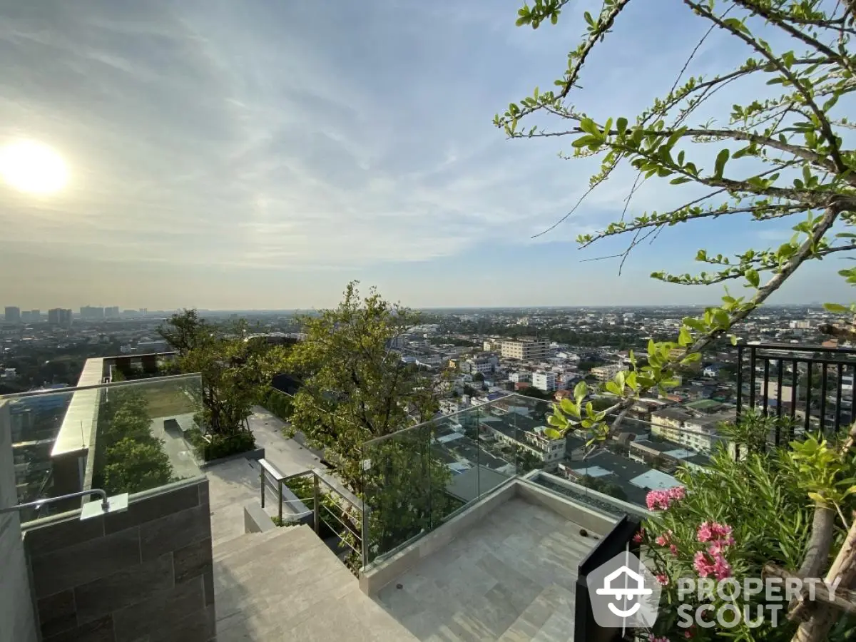 Stunning rooftop view with cityscape and lush greenery, perfect for urban living enthusiasts.