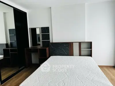 Modern bedroom with sleek design and stylish furniture