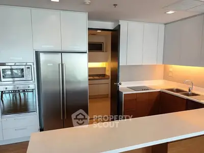 Modern kitchen with sleek appliances and open layout design