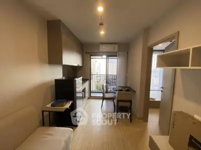 Modern apartment interior with open layout and city view balcony