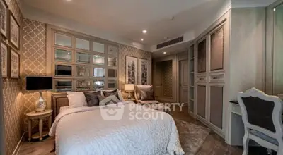 Luxurious bedroom with elegant decor and stylish furnishings in a modern apartment.