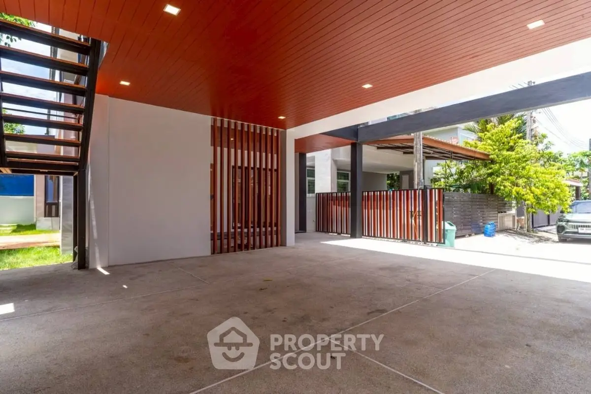 Spacious modern parking area with sleek wooden accents and open design.