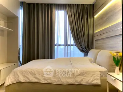 Modern bedroom with elegant decor and natural light