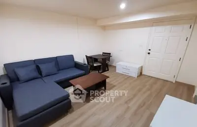 Cozy living room with modern furniture and wooden flooring