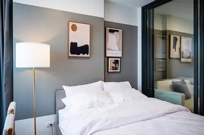 Modern bedroom with stylish decor and cozy ambiance