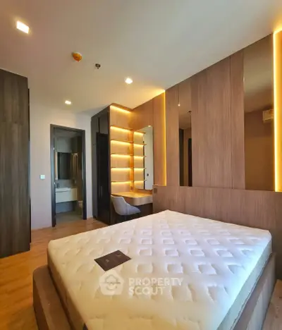 Luxurious modern bedroom with stylish lighting and elegant decor