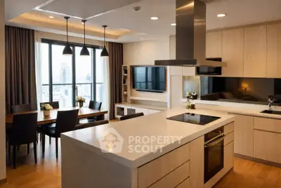 Modern open kitchen with island and dining area in luxury apartment with city view.