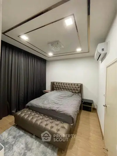 Luxurious bedroom with elegant decor and modern lighting