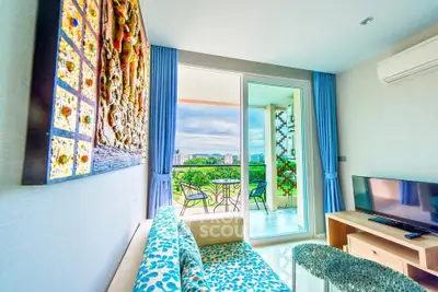 Bright living room with balcony view and modern decor