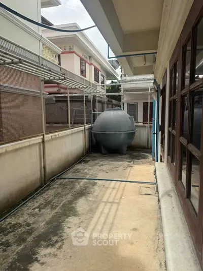 Spacious outdoor area with potential for customization in a residential property.