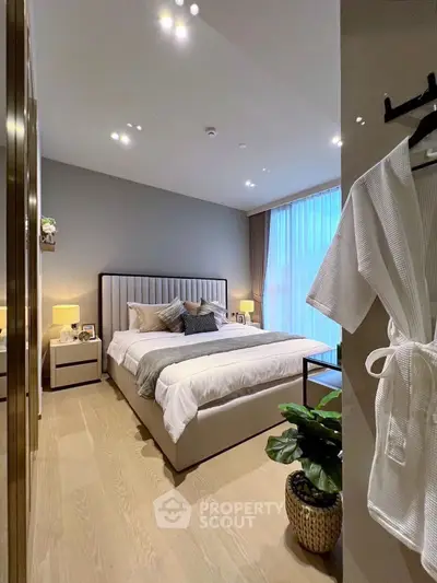 Luxurious modern bedroom with elegant decor and natural light