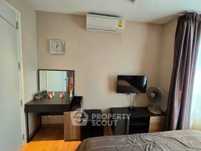 Cozy bedroom with modern furniture and air conditioning