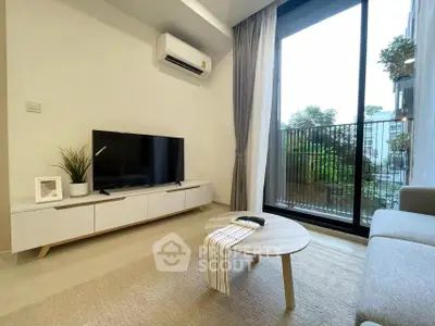 Modern living room with sleek design and balcony view