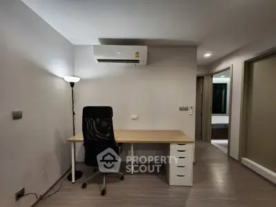 Modern study room with sleek desk and chair, ideal for productivity and comfort.