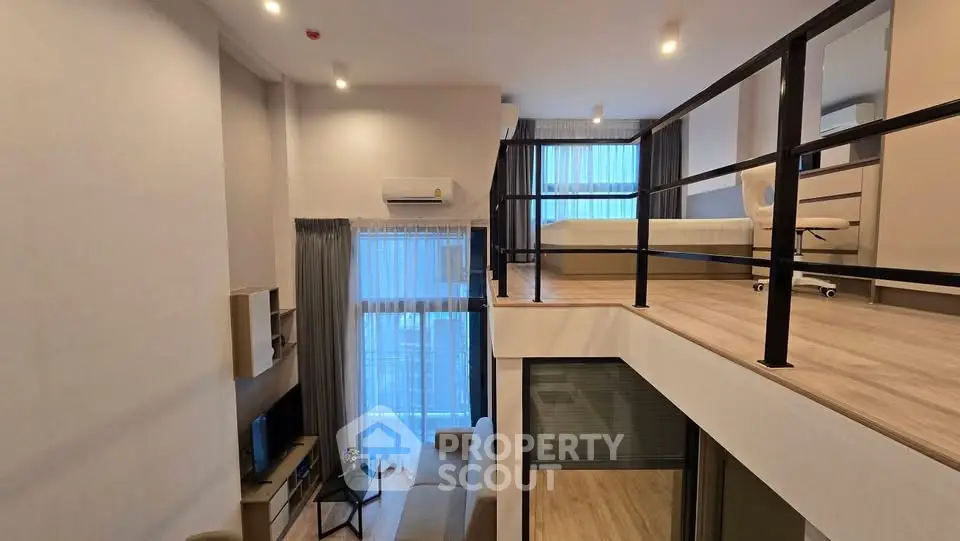 Modern loft apartment with high ceilings and stylish mezzanine bedroom