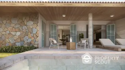 Luxurious poolside patio with stylish loungers and stone wall accents