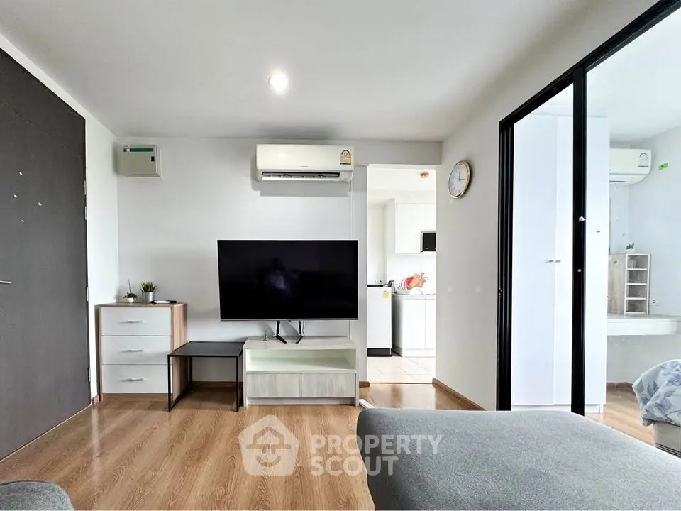 Modern living room with sleek TV setup and stylish decor