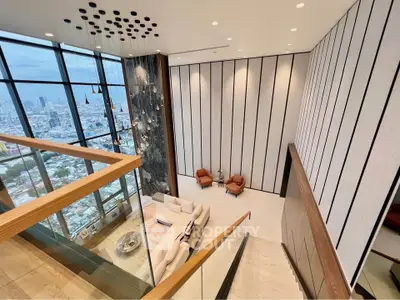 Luxurious high-rise living room with stunning city view and modern decor