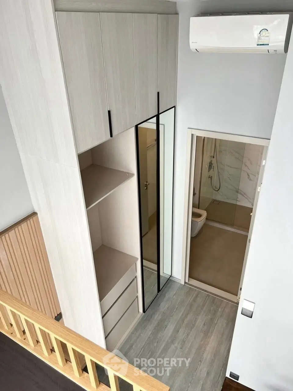 Modern compact apartment with loft-style design and sleek bathroom