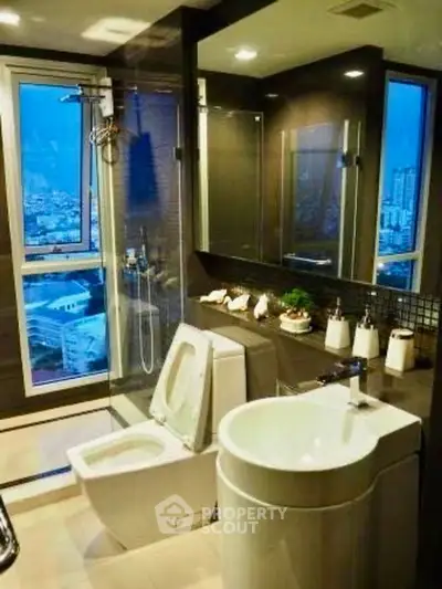 Luxurious bathroom with city view, modern fixtures, and elegant design.