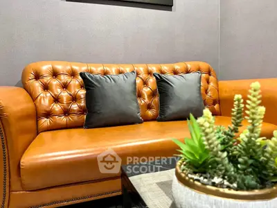 Luxurious leather sofa in modern living room with stylish decor