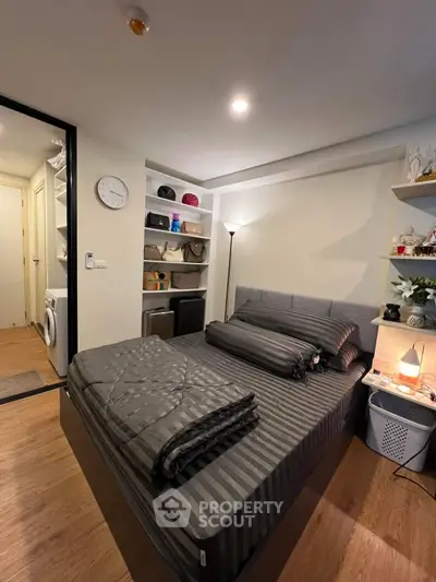 Cozy bedroom with modern decor and built-in storage solutions
