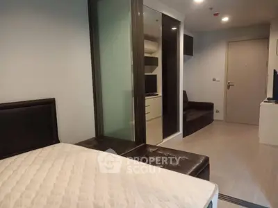 Modern studio apartment with sleek design and comfortable furnishings