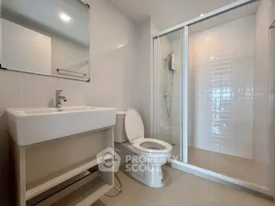 Modern bathroom with sleek shower and contemporary fixtures