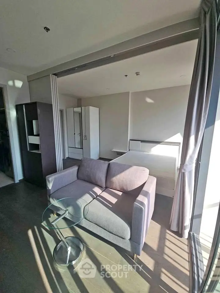 Modern studio apartment with stylish furniture and ample natural light