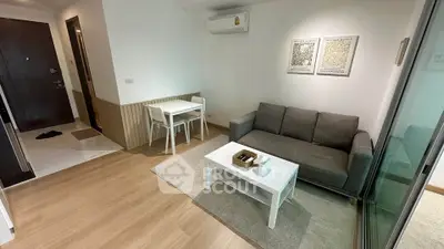 Modern living room with cozy sofa and dining area in stylish apartment