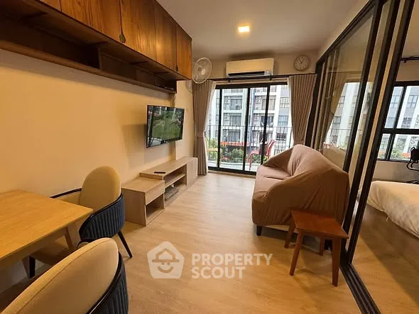 Modern living room with balcony view in stylish apartment