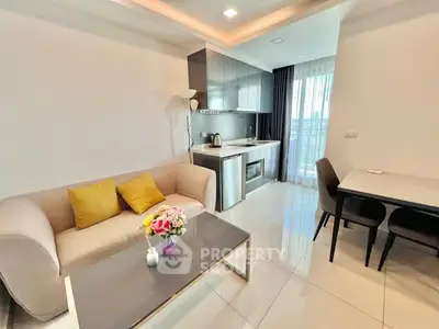 Modern living room with open kitchen and stylish furniture