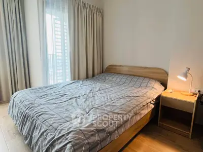 Cozy bedroom with modern decor and natural light