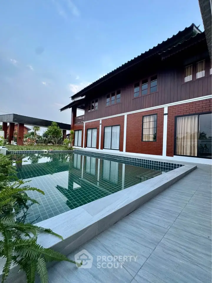 Stunning modern home with private pool and lush garden, perfect for luxury living.