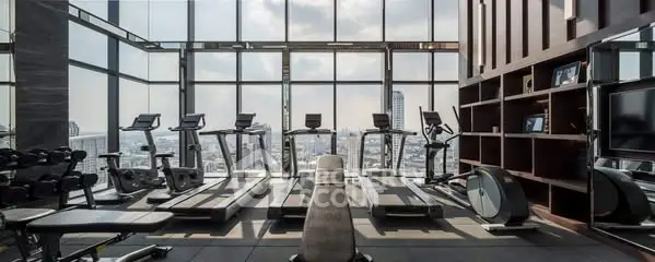 Luxurious high-rise gym with panoramic city views and modern fitness equipment.