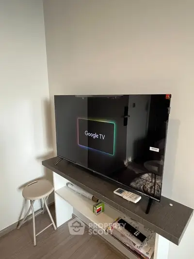 Modern living room with sleek TV setup and minimalist decor