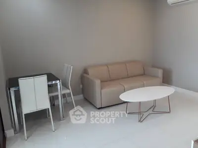 Modern living room with sleek furniture and neutral tones