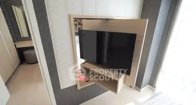 Modern living room with sleek TV setup and stylish decor