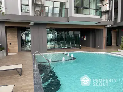 Luxurious modern apartment complex with swimming pool and fitness center