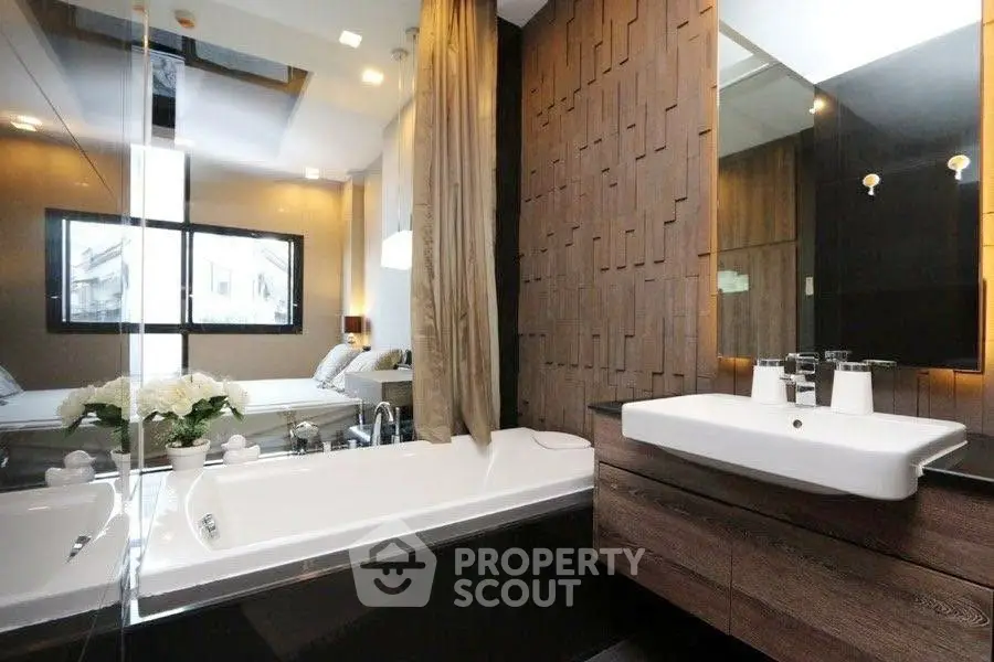 Luxurious modern bathroom with elegant bathtub and stylish wooden accents
