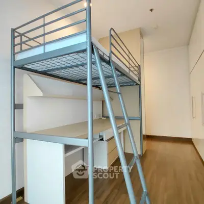 Modern loft bed with integrated desk in stylish apartment