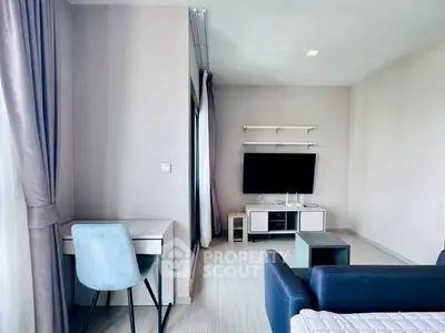 Modern living room with sleek furniture and natural light