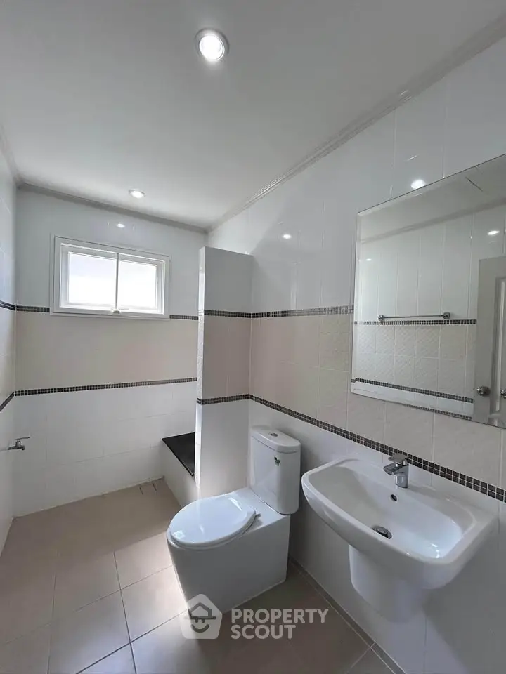 Modern bathroom with sleek fixtures and natural light