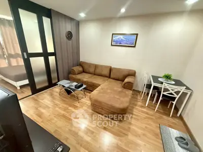 Cozy living room with brown sectional sofa and modern decor