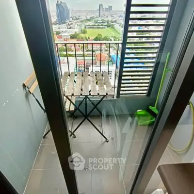 Charming balcony with city view, perfect for relaxation and enjoying the skyline.