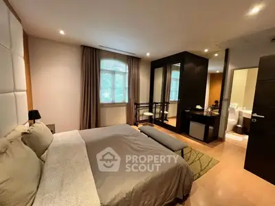 Luxurious bedroom with modern decor and ensuite bathroom